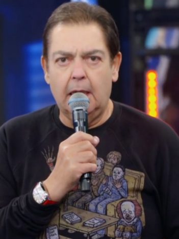 Fausto Silva no comando do Domingão do Faustão; apresentador está vetado de aparecer na Band (Foto: Reprodução/TV Globo)