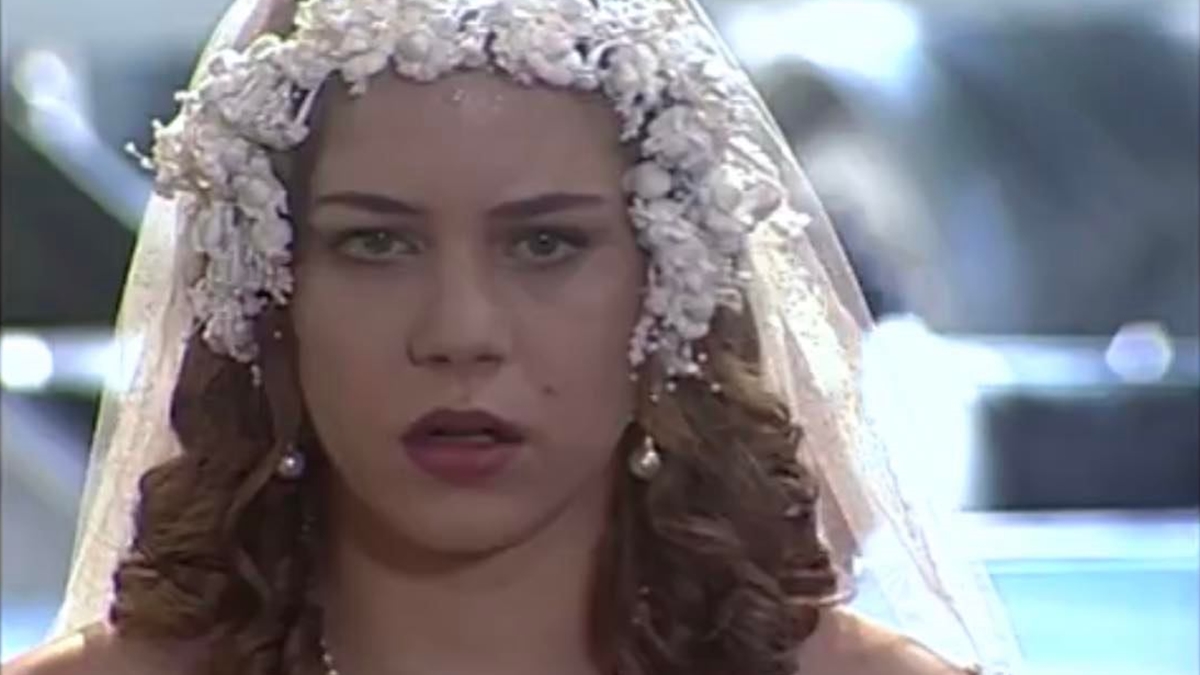 Bianca (Leandra Leal) foge do casamento com Heitor (Rodrigo Faro) em O Cravo e a Rosa (Foto: Reprodução/TV Globo)