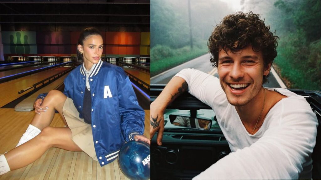 Bruna Marquezine surge vestida com casaco azul e ao lado, Shawn Mendes aparece de regata branca