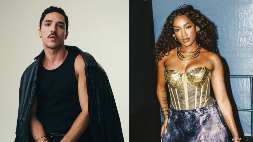 João Vitor Silva, homem de regata preta e jaqueta de couro ao lado de IZA, mulher com corset dourado e cabelos cacheados.