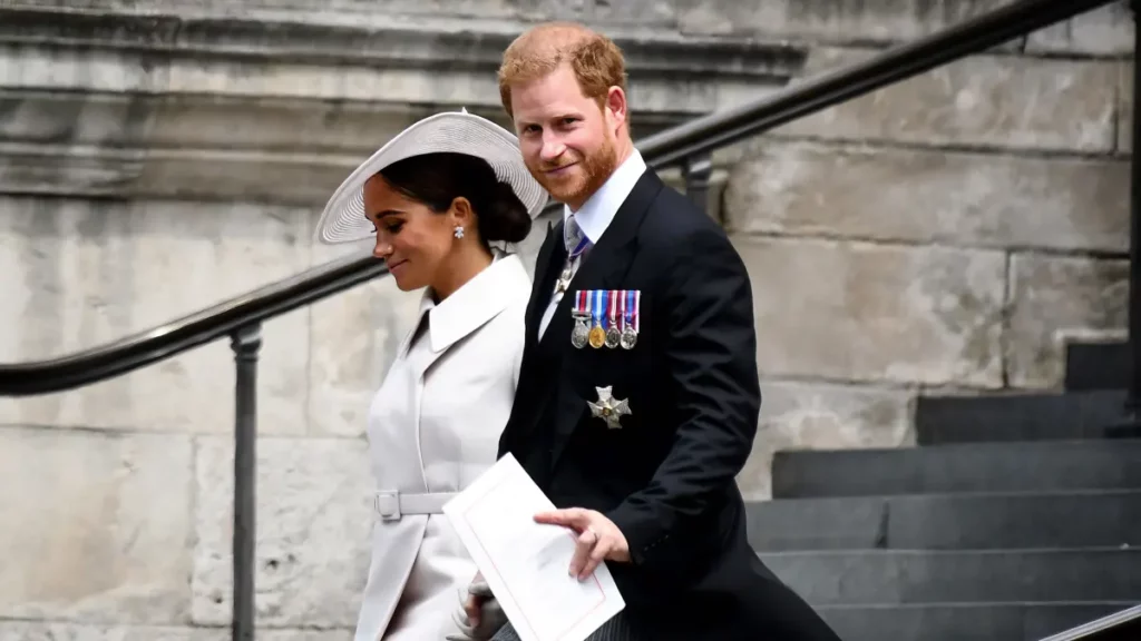 Príncipe Harry e Meghan Markle durante evento no Reino Unido.