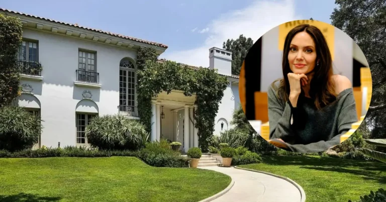 Angelina Jolie aparece em retrato ao lado da mansão de fachada branca e amplo jardim que foi vendida pela atriz
